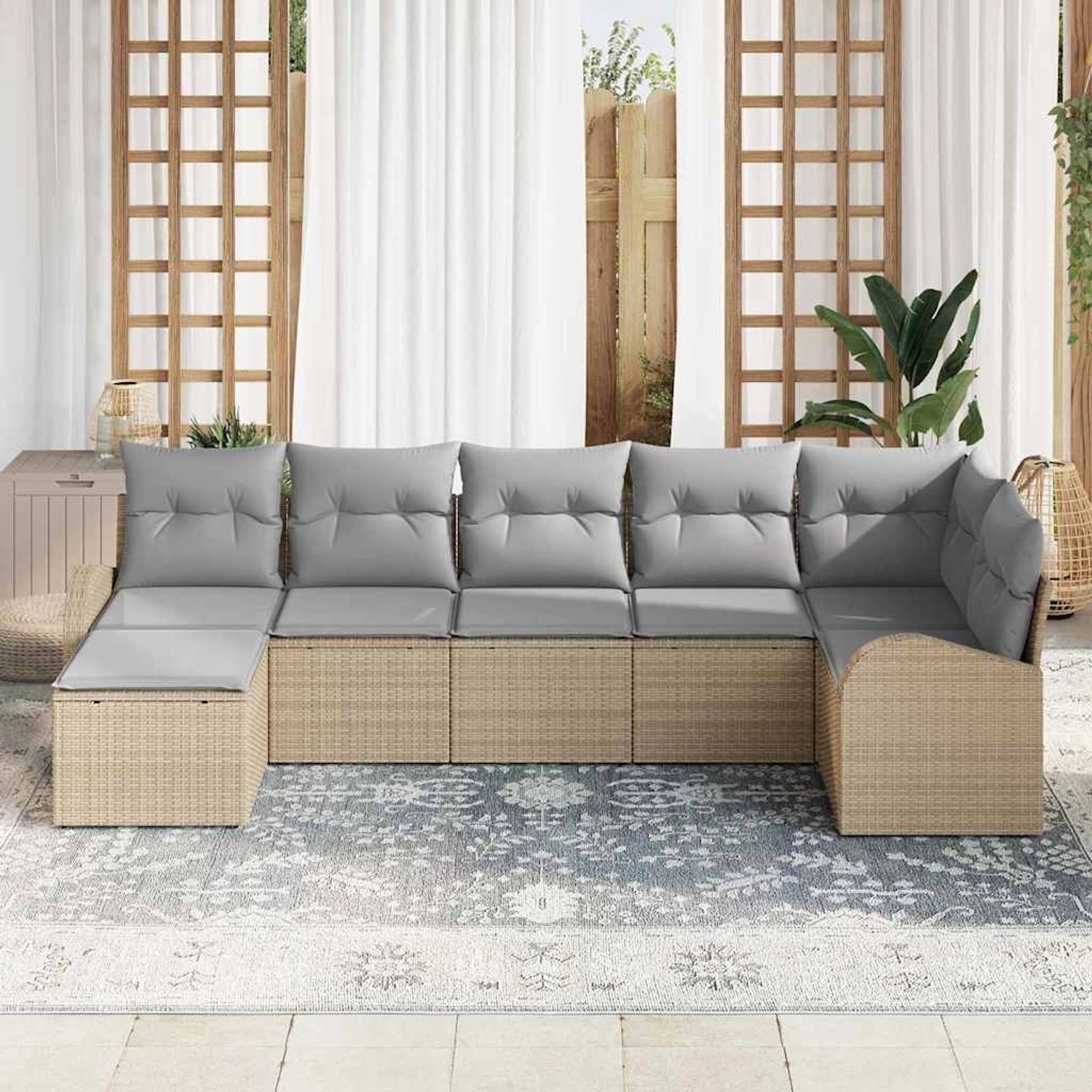 Beiges 7-teiliges vidaXL Garten-Sofa-Set aus Poly Rattan mit grauen Kissen.