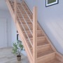 Mykonos Pro Buche Treppe, 1/4 gewendelt links, mit Holz-Edelstahl-Geländer. FSC®-zertifiziert.