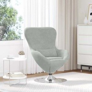 Hellgrauer Samt Eiersessel mit drehbarer Metallbasis im Wohnzimmer. Moderner Loungesessel für Komfort.