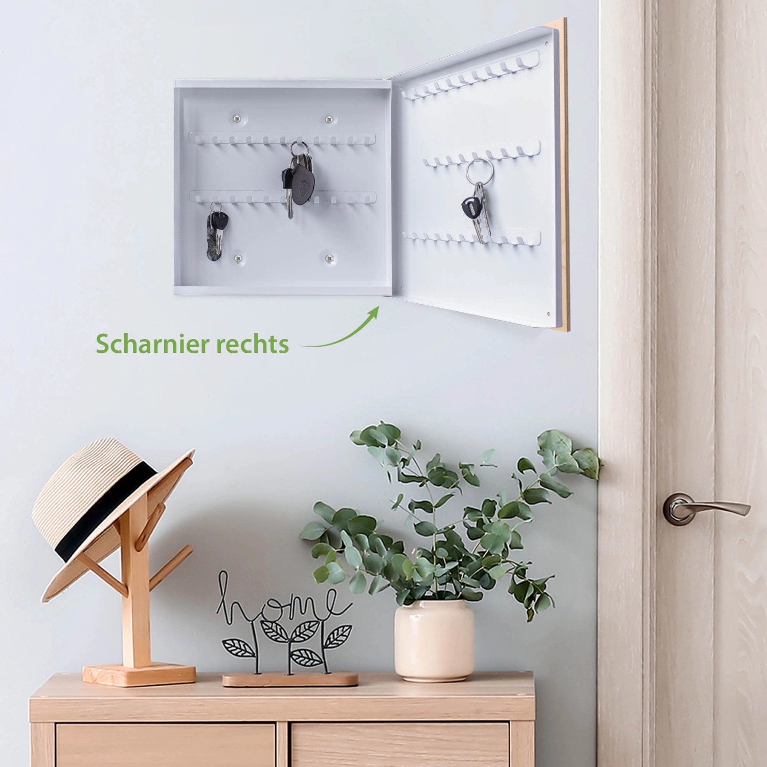 Offener, weißer Banjado Schlüsselkasten mit Blütenklang-Motiv, 50 Haken, Scharnier rechts.