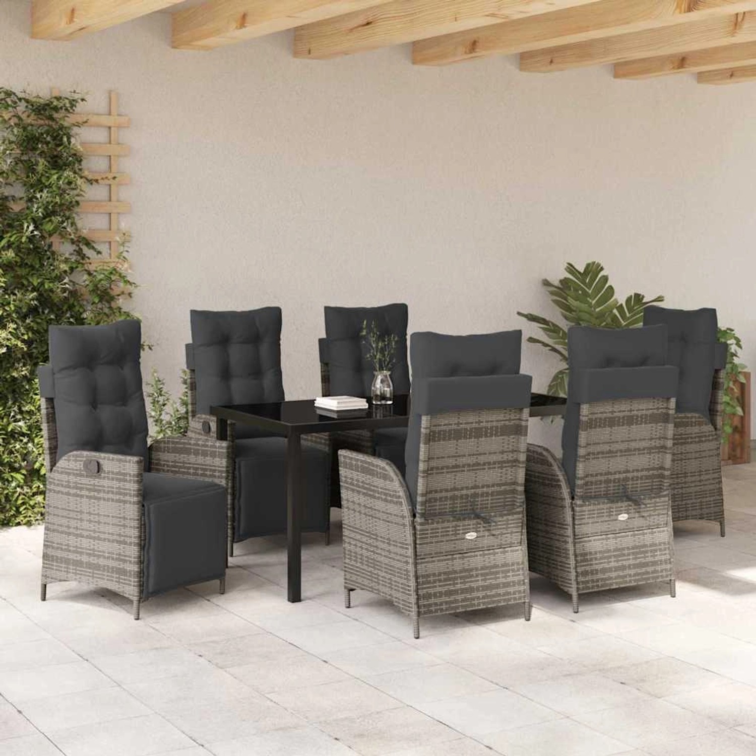 Graue 7-teilige Garten Essgruppe aus Polyrattan mit verstellbaren Stühlen und Tisch mit Glasplatte.