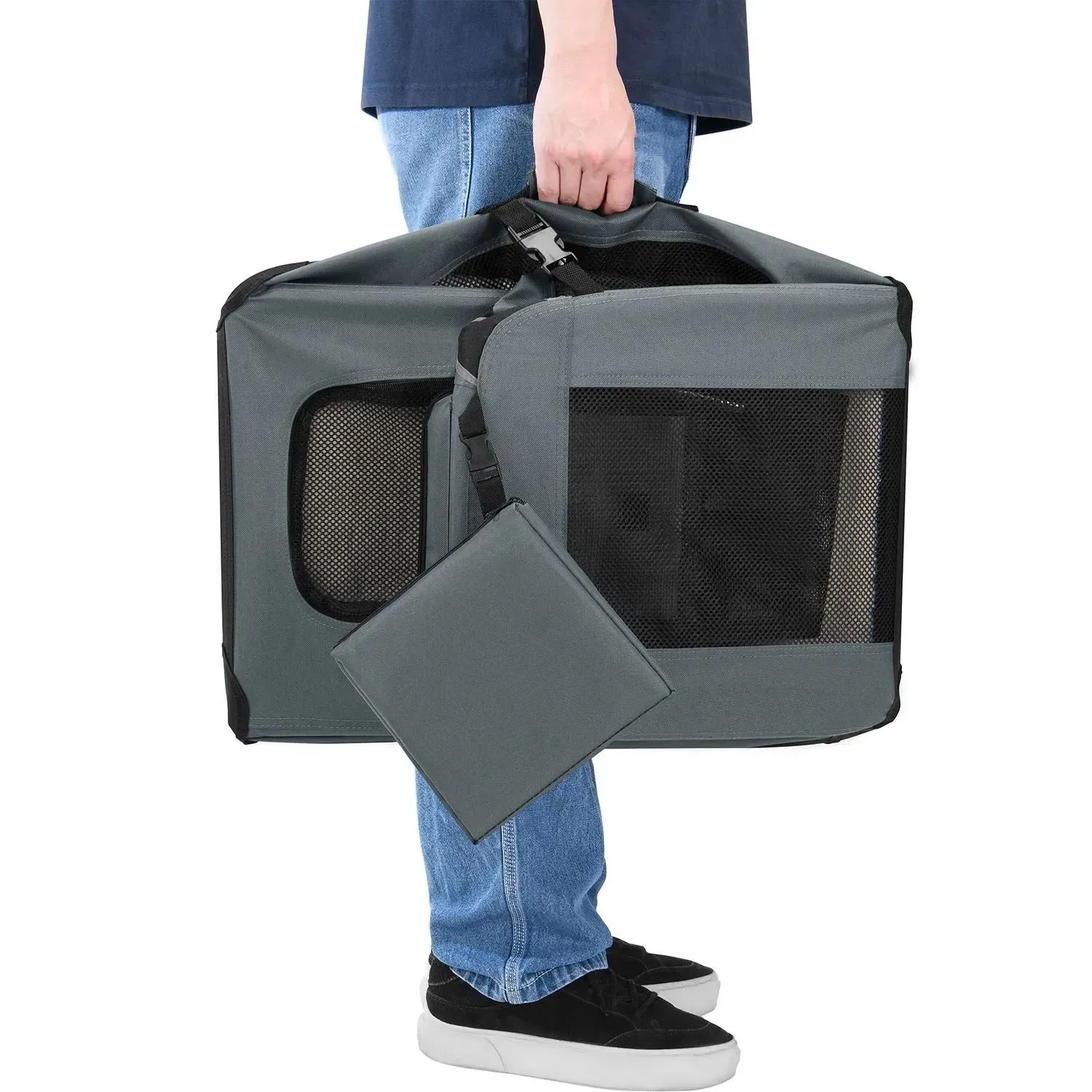 Graue Juskys Hundetransportbox Lassie XL, faltbar, mit Tragegurt und Netzfenstern.