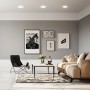 Wohnraum mit drei weißen Briloner LED Einbaustrahlern für Bad und Wohnbereich mit warmweißem Licht.