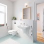 Modernes Bad mit Grohe Wand-Tiefspül-WC Start Edge und passendem Waschbecken in Alpinweiß.