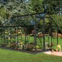 Schwarzes Halls Gewächshaus Popular 106 mit Pflanzen im Garten.