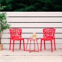 Rotes Homestyle4u Gartenstuhl 2er Set mit Lochmuster und kleinem Tisch auf Terrasse.