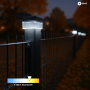Solar Zaunleuchte LED auf 60x40 mm Pfosten, neutralweißes Licht. Mehrere Leuchten beleuchten den Stabmattenzaun bei Nacht.