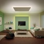 Wohnzimmer mit indirekter Beleuchtung durch Paulmann LED-Strip MaxLED, warmweiß.