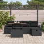Schwarzes 6-teiliges Garten-Sofa-Set aus Poly Rattan mit Tisch und Kissen.