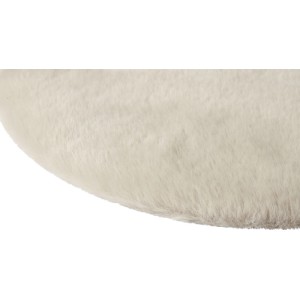 Nahaufnahme eines runden Kunstfell-Sitzkissens in Taupe. Zeigt die flauschige, weiche Textur des Kissens.