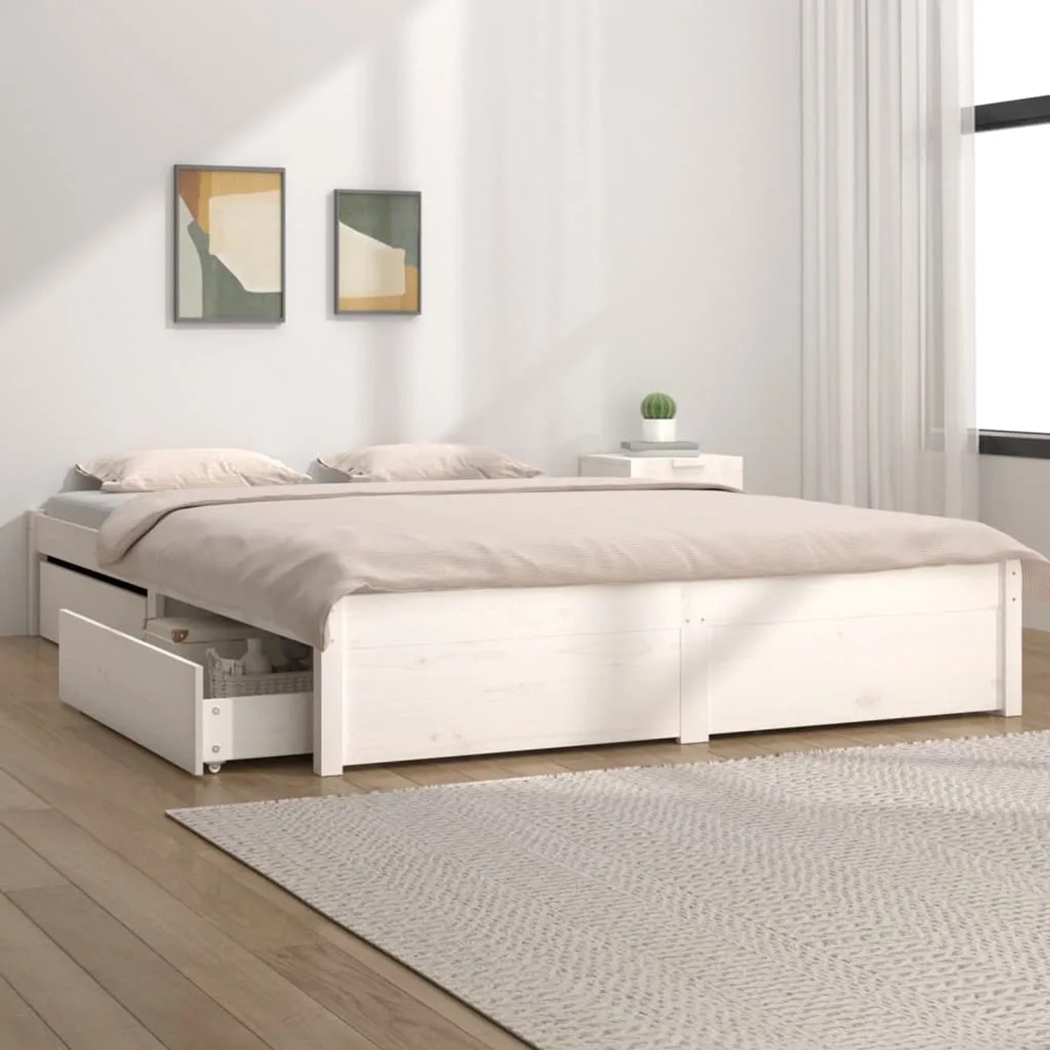 Weißes Holzbett 120x200 cm mit Schubladen für zusätzlichen Stauraum im Schlafzimmer.