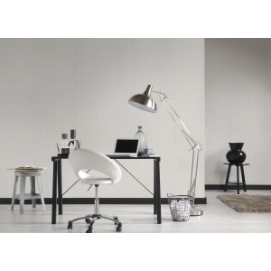 Strukturierte, graubraune Vliestapete Metropolitan Stories Vintage im Wohnraum.