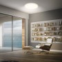 Dimmbares, weißes Brilo LED-Panel Slim Sternenhimmel, montiert an einer Decke in einem Wohnzimmer.
