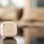 Beiger Shelly Blu Button Tough: Bluetooth-Taster für Hausautomation, stoß- und wasserfest.