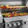 Taino Platinum Yamara 4+2 Gasgrill mit Grillgut wie Gemüse, Fleisch und Maiskolben.