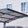 Moderner Palram Canopia Carport Arizone Wave mit gebogenem, transparentem Dach und stabiler Aluminiumkonstruktion.