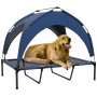 Blaues PawHut Hundebett mit Baldachin, atmungsaktiv und erhöht, mit Golden Retriever.
