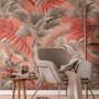 Fototapete Dschungelmotiv in Rosa, Lachsrot und Beige-Grau mit Sessel im Wohnraum.