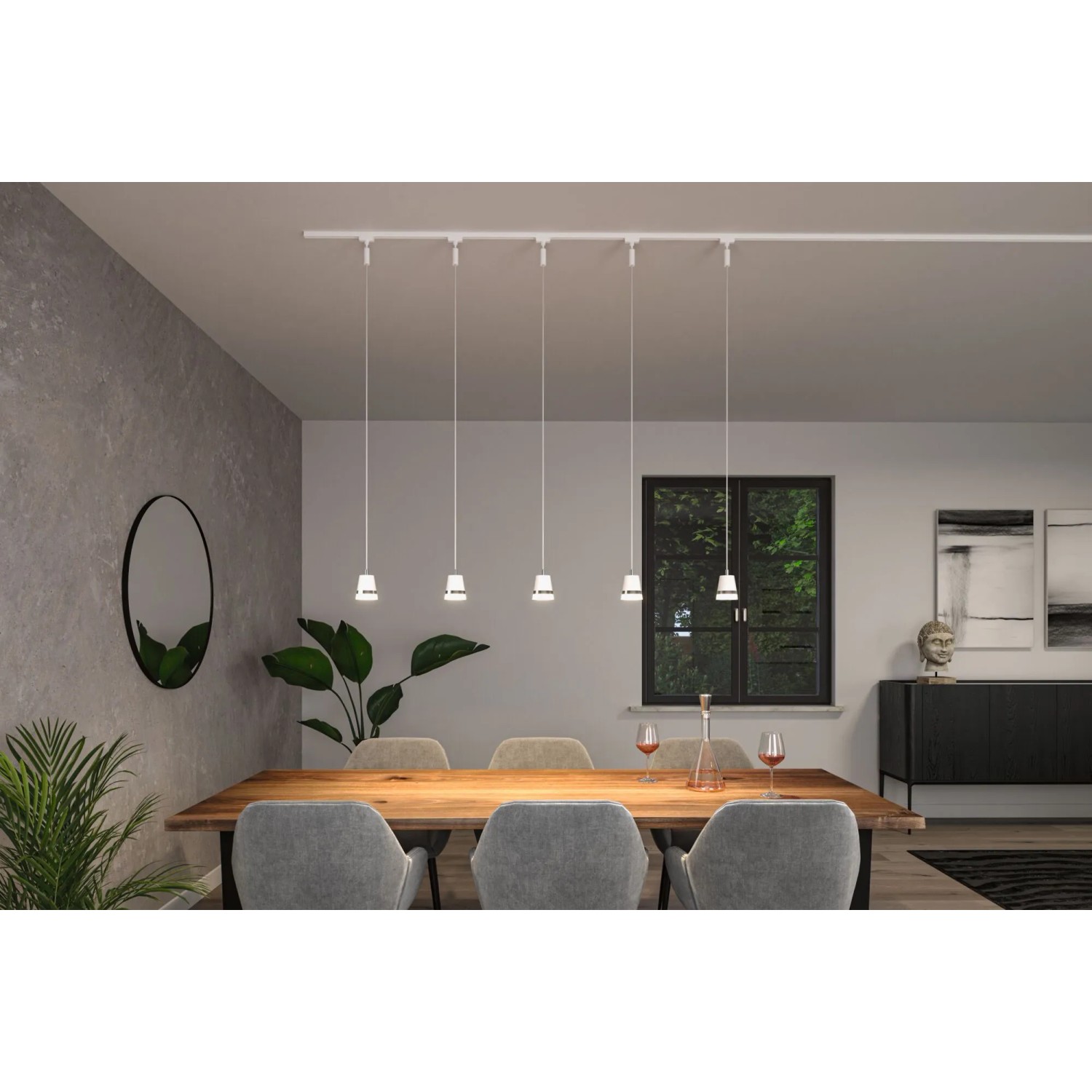 Mehrere Paulmann Cone URail Pendelleuchten in Signalweiß über einem Esstisch. LED-Schienensystem.