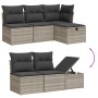 Hellgraue 6-tlg. Garten-Sofagarnitur aus Polyrattan mit dunklen Kissen und Stauraum.