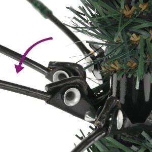 Detailaufnahme: Klappmechanismus des künstlichen Weihnachtsbaums mit Ständer.