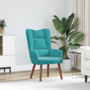 Moderner türkiser Samt Relaxsessel mit hohen Rückenlehnen und konischen Holzbeinen, platziert in einem hellen Wohnzimmer.