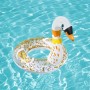 Glitzernder Bestway Schwimmring mit Schwan-Motiv im Wasser.