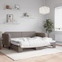 Ausgezogenes, taupefarbenes vidaXL Tagesbett/Schlafsofa (80x200 cm) mit weißer Bettwäsche im Wohnzimmer.