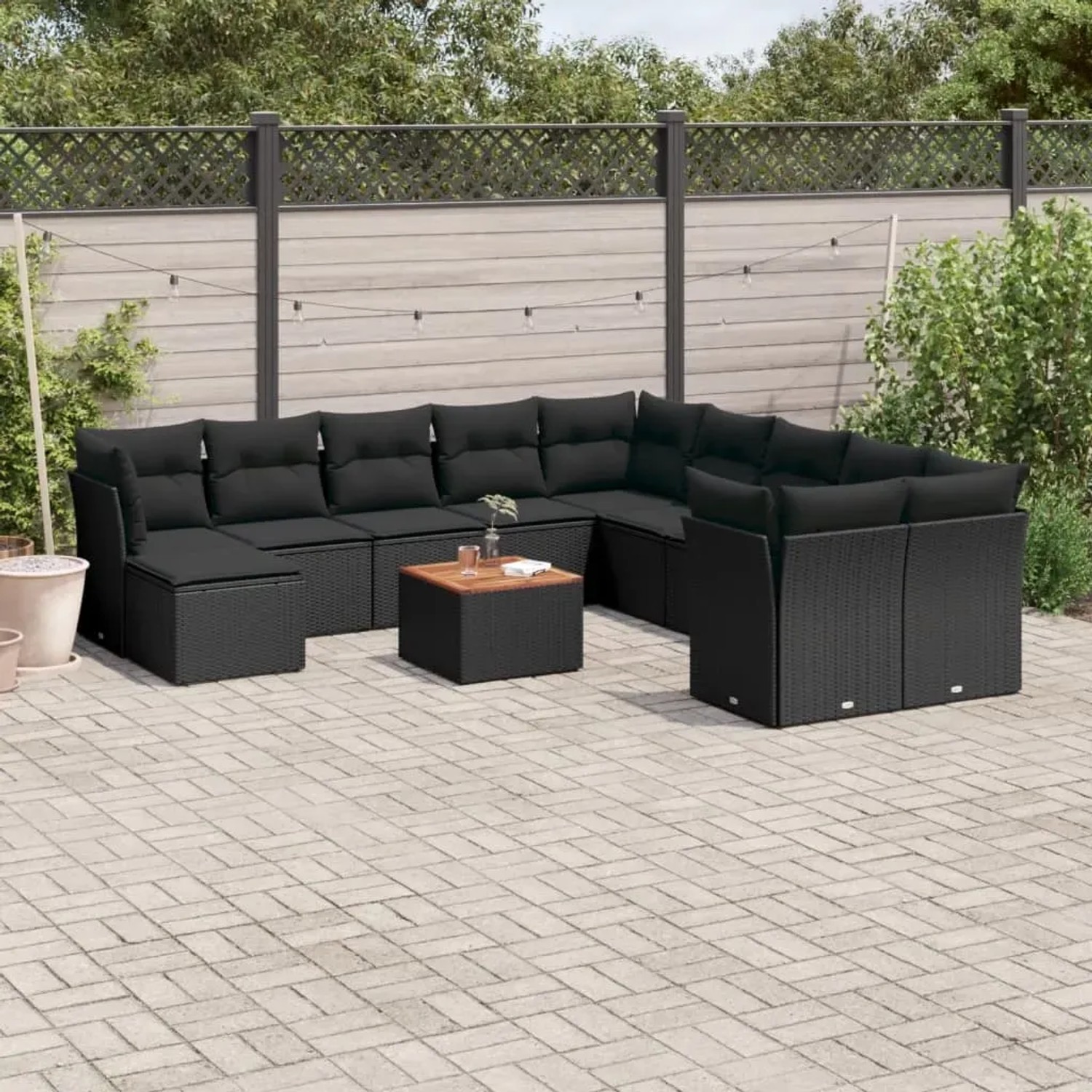 Schwarze 12-tlg. vidaXL Garten-Sofagarnitur aus Poly Rattan mit Kissen. Gartenmöbel für Terrasse und Garten.