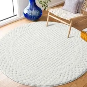 Runder, pastell-cremefarbener Hochflor Teppich Nara mit Rautenmuster, 160x160 cm.