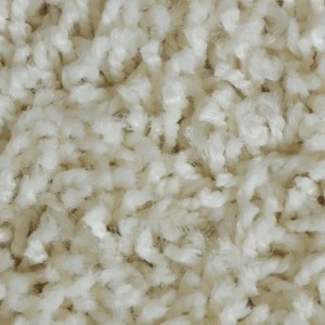 Detailaufnahme: Cremefarbener KARAT Shaggy Teppich Barcelona mit weichem Flor.