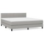 Hellgraues vidaXL Boxspringbett 180x200 cm mit Matratze und Kopfteil.