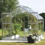 Gewächshaus Diana 5000 mit Alu-Rahmen und ESG-Verglasung im Garten.
