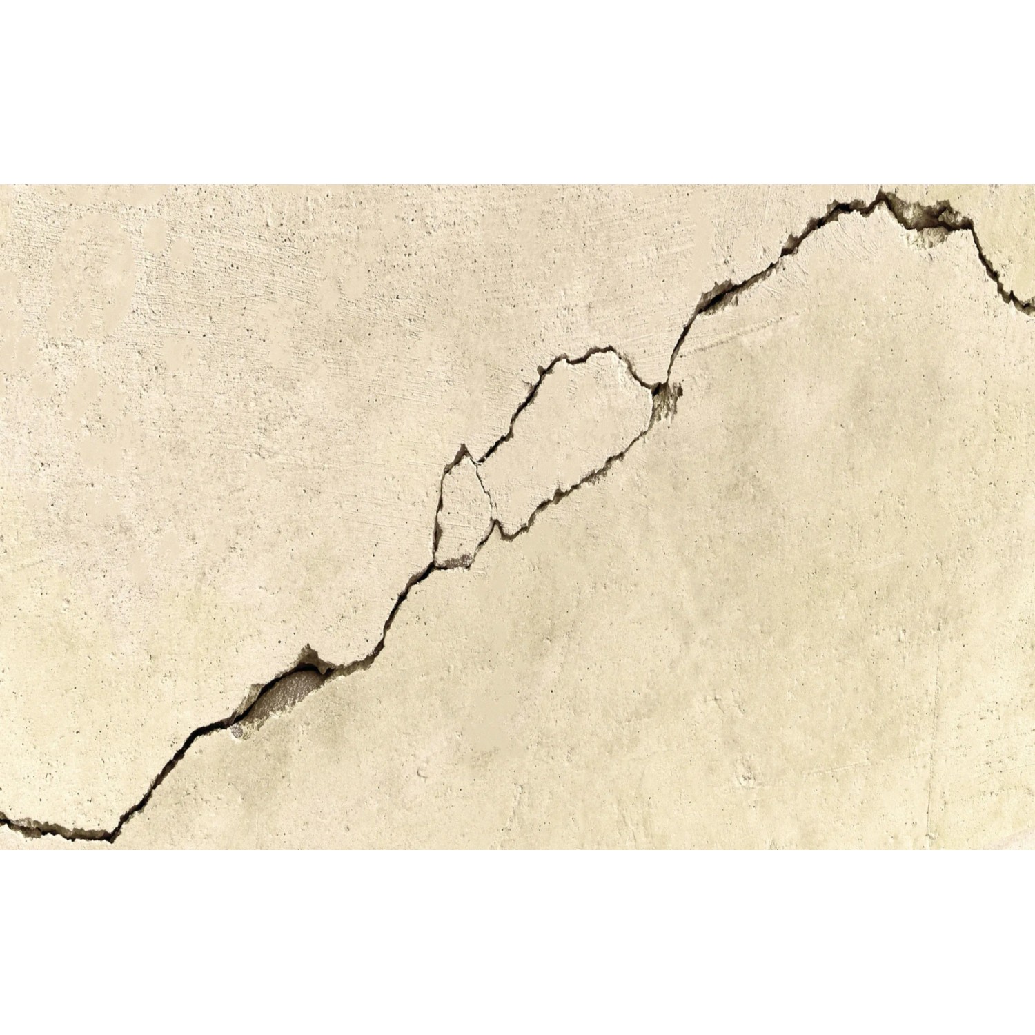 Riss in beiger Wand, reparierbar mit Fischer Reparaturspachtel (3er-Pack).