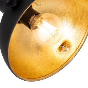 Detailaufnahme der schwarzen QAZQA Deckenleuchte Magnax mit goldener Innenseite und E14 Fassung.