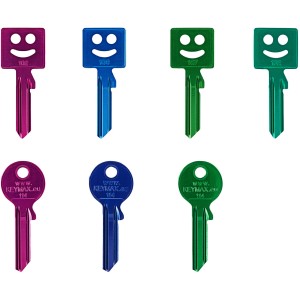 Farbige Zylinderschloss-Schlüssel aus Aluminium in verschiedenen Ausführungen mit Smiley.