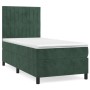 Dunkelgrünes Boxspringbett mit Matratze und Kopfteil, Samtbezug.
