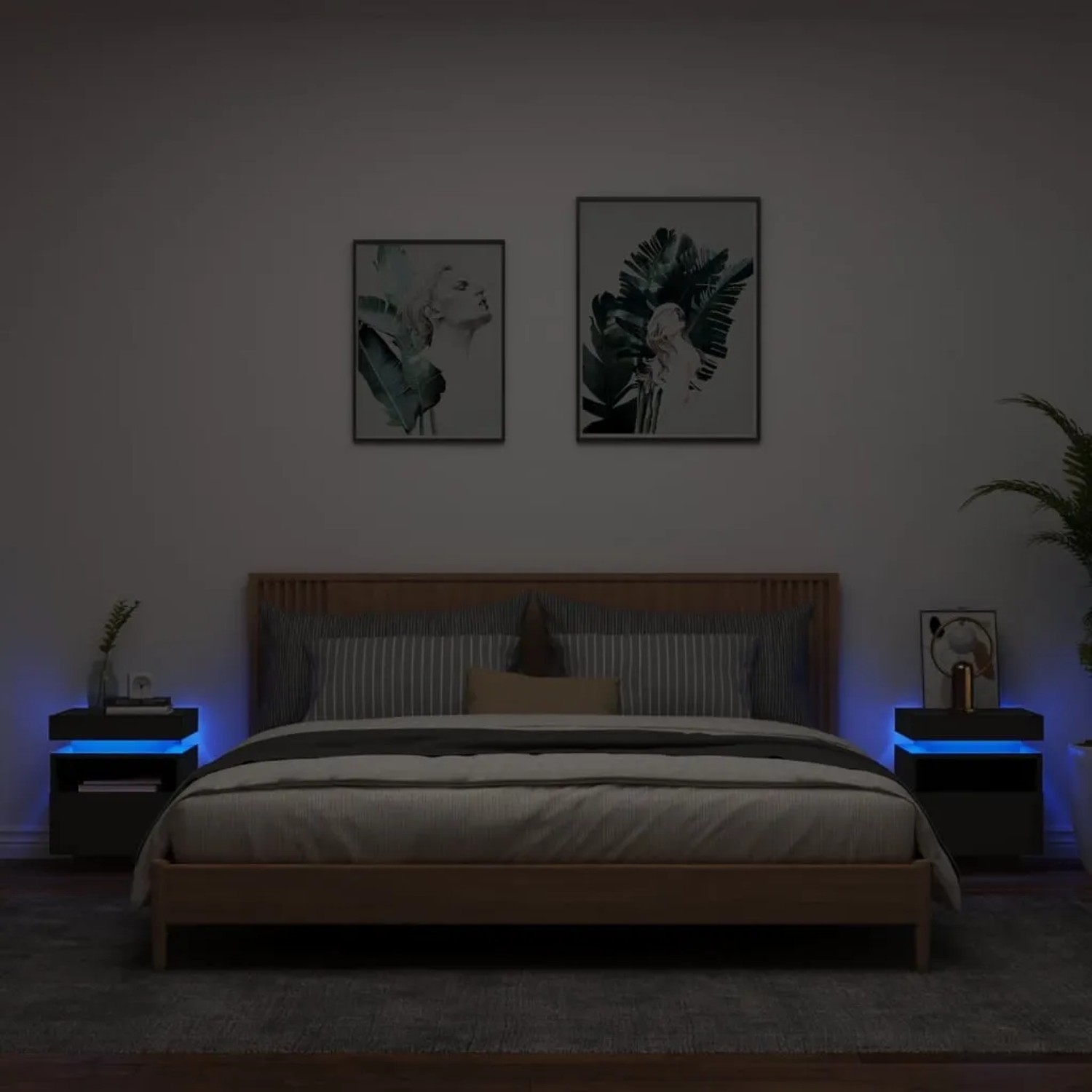 Zwei schwarze Nachttische mit LED-Beleuchtung im Schlafzimmer.