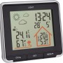 Schwarze TFA Funk-Wetterstation Life mit Sensor-Touch zeigt Innen- und Außentemperatur.