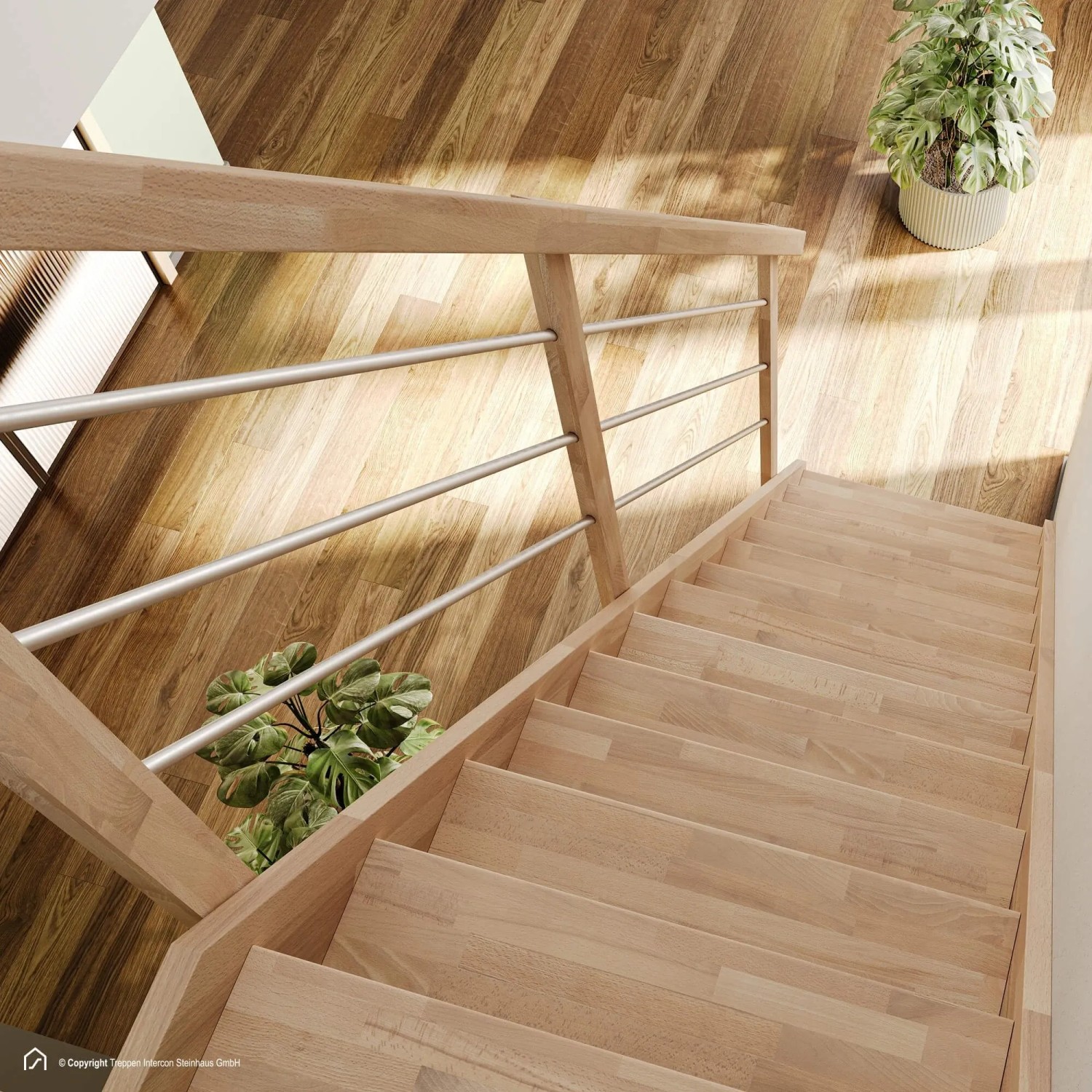 Blick von oben auf eine helle Holz-Raumspartreppe Intercon Palermo mit Edelstahlgeländer. Treppe 73 cm breit, für Geschosshöhen bis 280 cm.