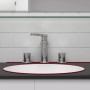 Weißes Waschbecken mit Armatur und Silikonfuge im Badezimmer.