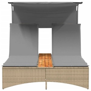 Beige Doppel-Sonnenliege mit Dach und Auflagen aus Poly Rattan für den Garten.
