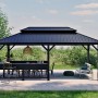 Sojag Pavillon Bondi Schwarz mit massivem Aluminiumgestell, Doppeldach aus Stahl und Ablagefläche auf Terrasse.