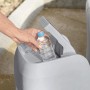 Detailaufnahme des hochklappbaren Bedienfelds am Bestway Lay-Z-Spa Whirlpool St. Lucia mit Wasserflasche.