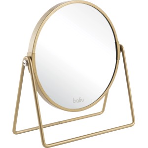 baliv Cosy Cave Kosmetikspiegel in mattem Gold mit Standfuß.