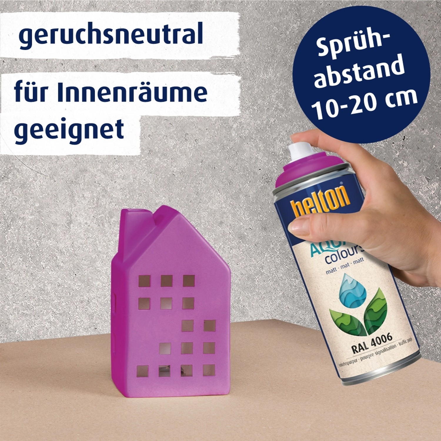 Belton Free AQUAcolours Buntlack Verkehrspurpur matt mit Farbbeispiel Haus und Hand.
