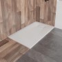 Weiße rechteckige Duschwanne VIDAR 160x90 cm aus Verbundwerkstoff in Steinoptik, bodenbündig mit Ablauf.
