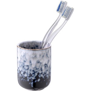 Blauer Wenko Zahnputzbecher Rosali aus Keramik mit zwei Zahnbürsten.