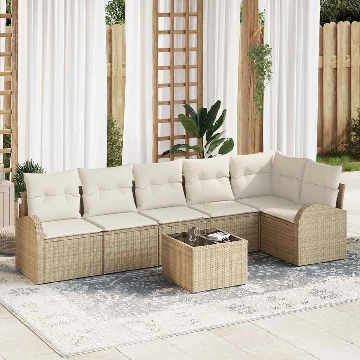 Beiges 7-teiliges vidaXL Garten-Sofa-Set aus Poly Rattan mit Kissen.