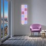 Wofi LED-Lichtkacheln 4er Basis-Set mit RGB Farbwechsel an Wand im Wohnraum.